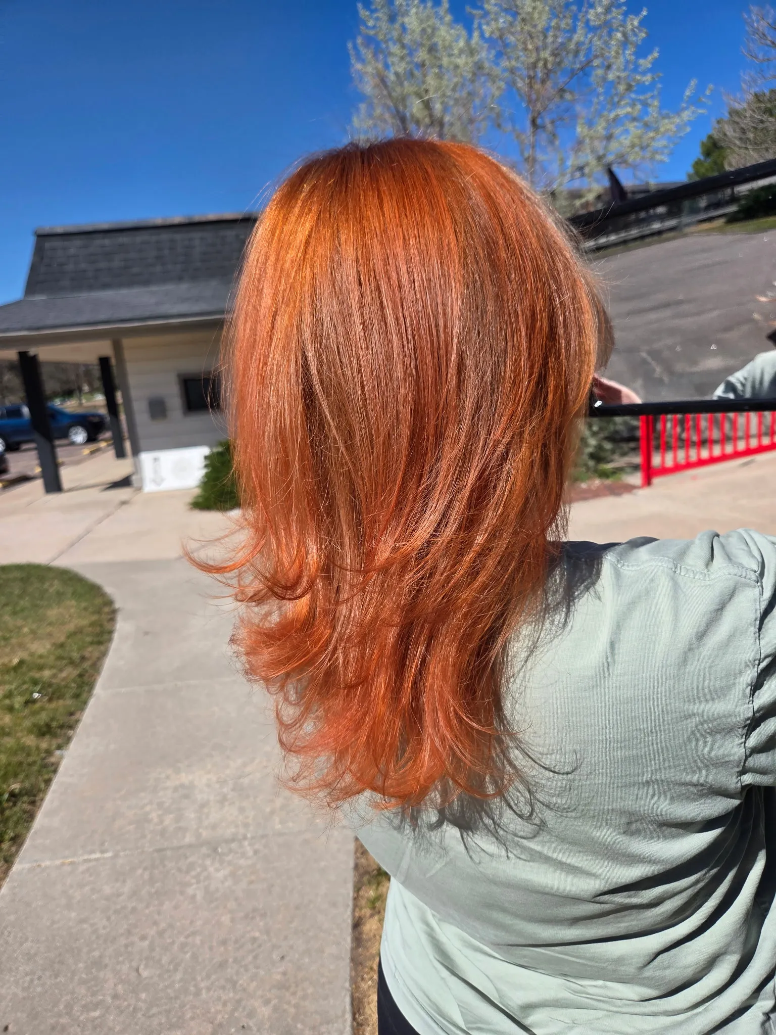 Bright copper long layers with soft flicked ends