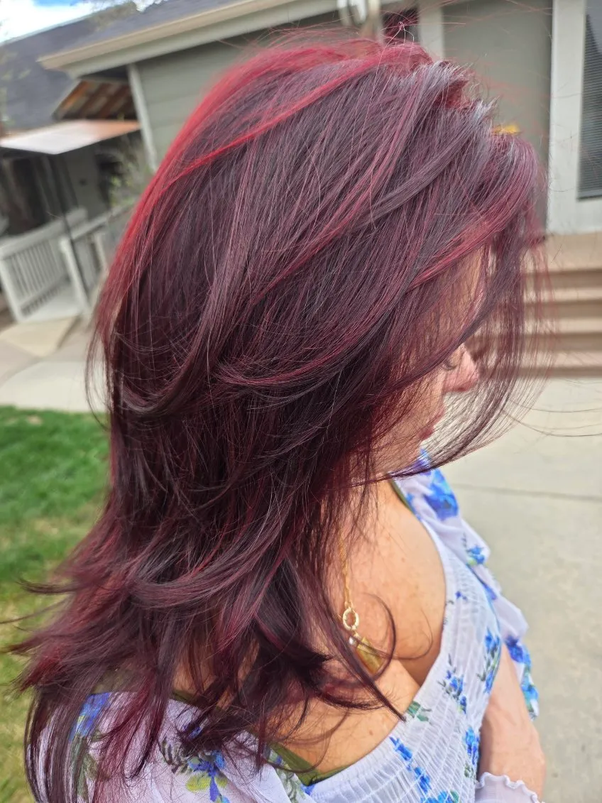 Glossy mahogany red layered cut, side profile